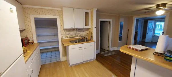 a room with a bed and furniture