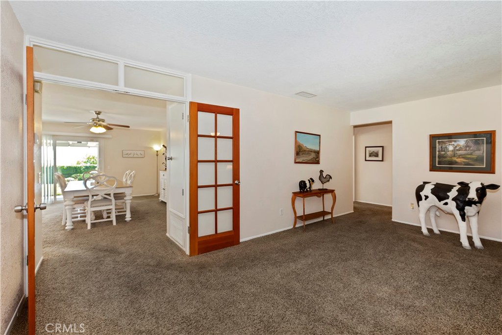8527 Hillside Road Rancho Cucamonga, CA 91701 - Photo 10 of 50 a view of a livingroom with furniture and a window
