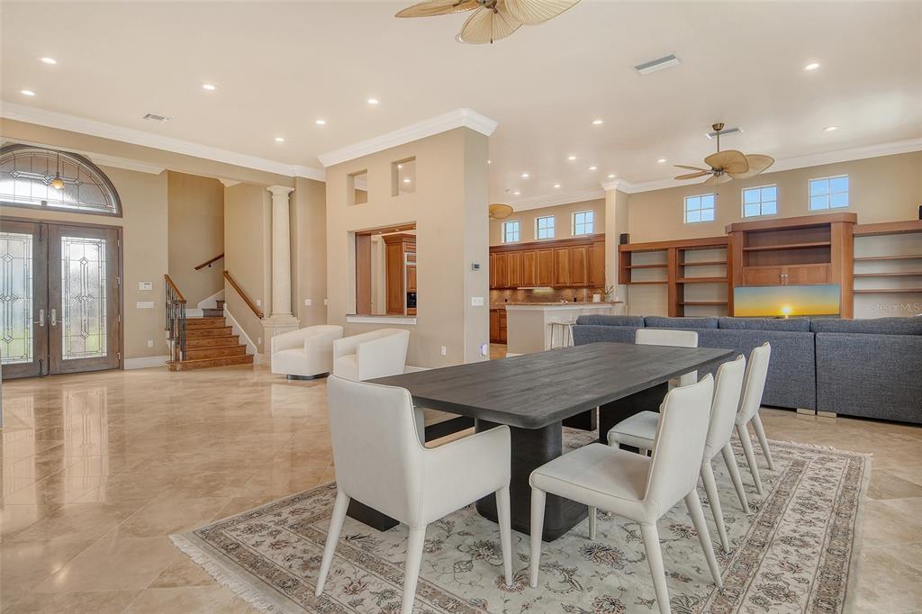 591 Putting Green Lane Longboat Key, FL 34228 - Photo 18 of 68 a view of a dining room with furniture