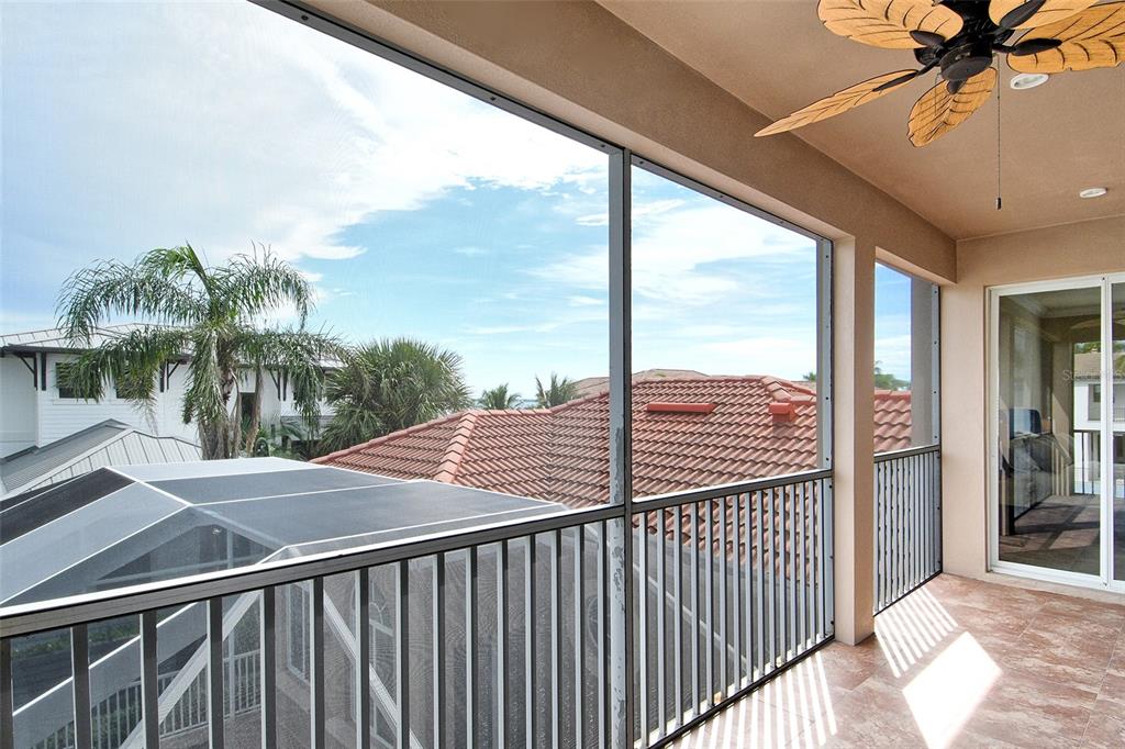 591 Putting Green Lane Longboat Key, FL 34228 - Photo 42 of 68 a view of a balcony with yard