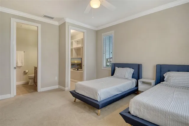 a view of a swimming pool with a table and chairs