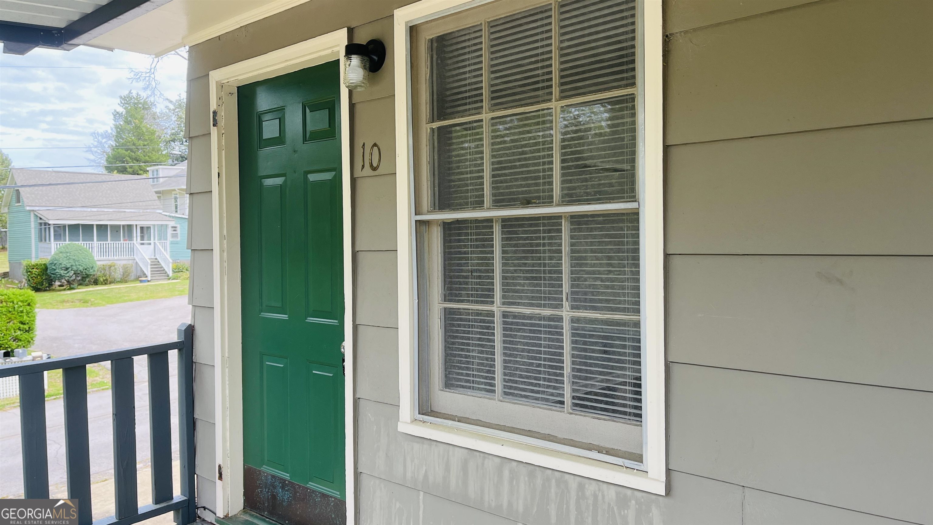 601 West Haralson Street, Unit 10 LaGrange, GA 30240 - Photo 2 of 11 a view of balcony and door
