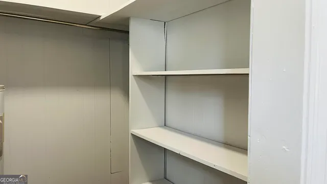 a hallway with closet
