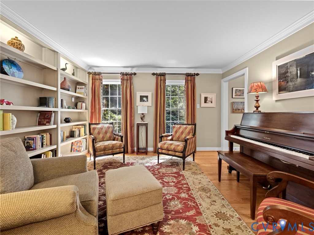 4428 Shirley Road Richmond, VA 23225 - Photo 12 of 70 Custom bookshelves have lighting.