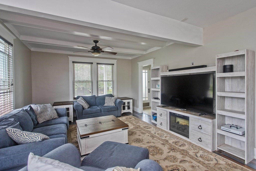 145 Carr Street Springfield, MA 01118 - Photo 5 of 41 a living room with furniture and a flat screen tv