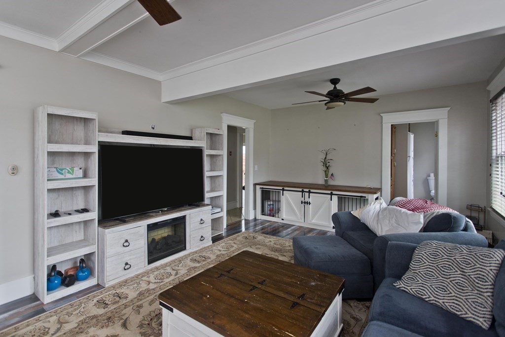 145 Carr Street Springfield, MA 01118 - Photo 8 of 41 a living room with furniture and a flat screen tv