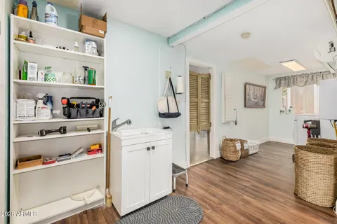 a view of entryway with wooden floor