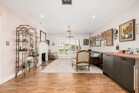 a view of a patio with table and chairs and potted plants