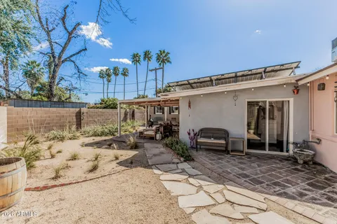 a view of a house with a sitting area