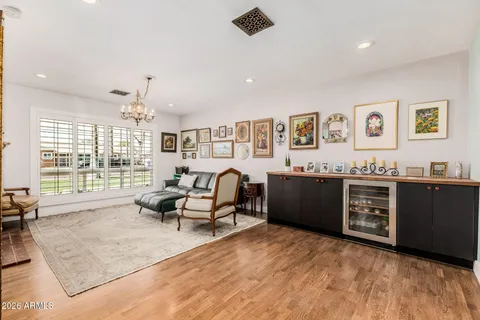 a living room with furniture and a rug