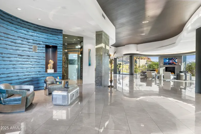 a lobby with furniture and outdoor seating