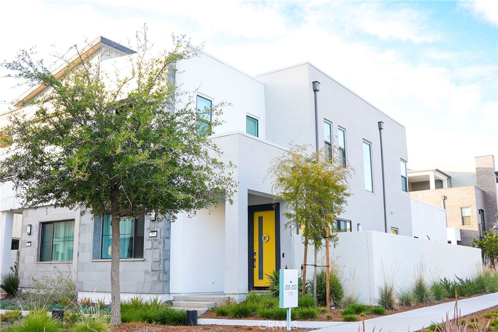 253 Novel Irvine, CA 92618 - Photo 1 of 1 a front view of a house with garden