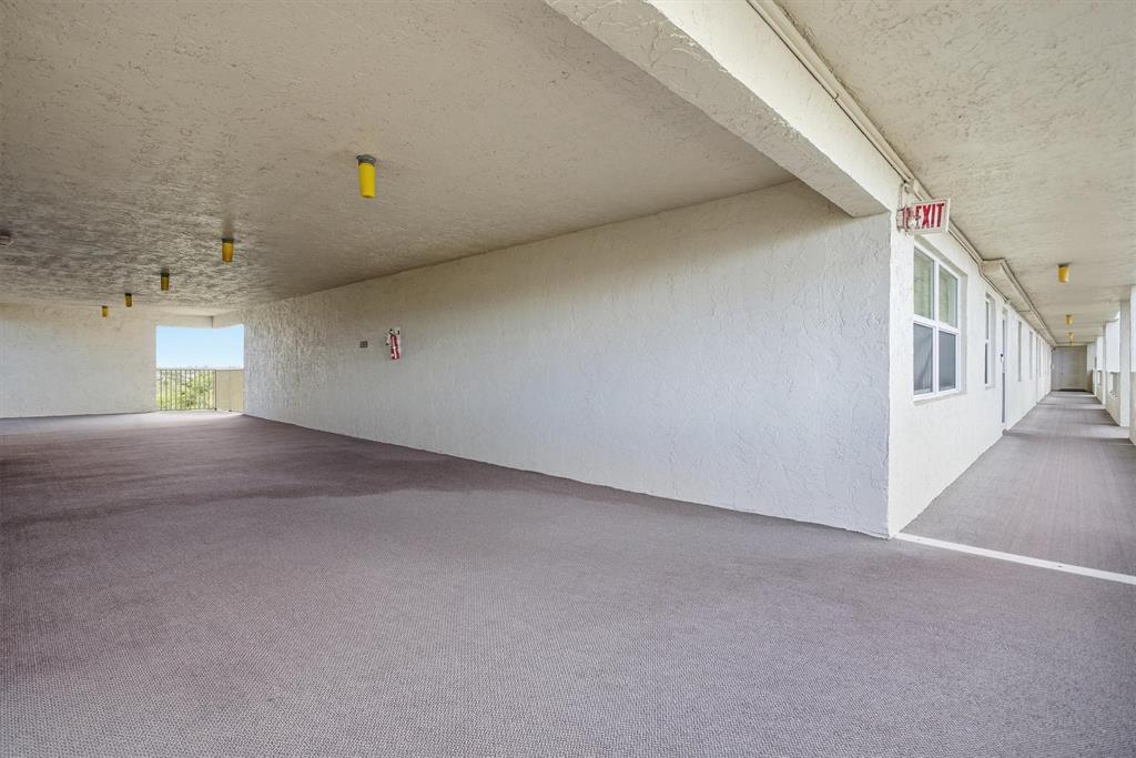 3910 Inverrary Boulevard, Unit 708B Lauderhill, FL 33319 - Photo 33 of 58 a view of a hallway with staircase