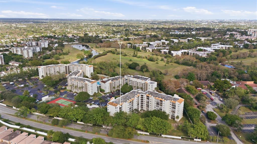 3910 Inverrary Boulevard, Unit 708B Lauderhill, FL 33319 - Photo 41 of 58 an aerial view of multiple house