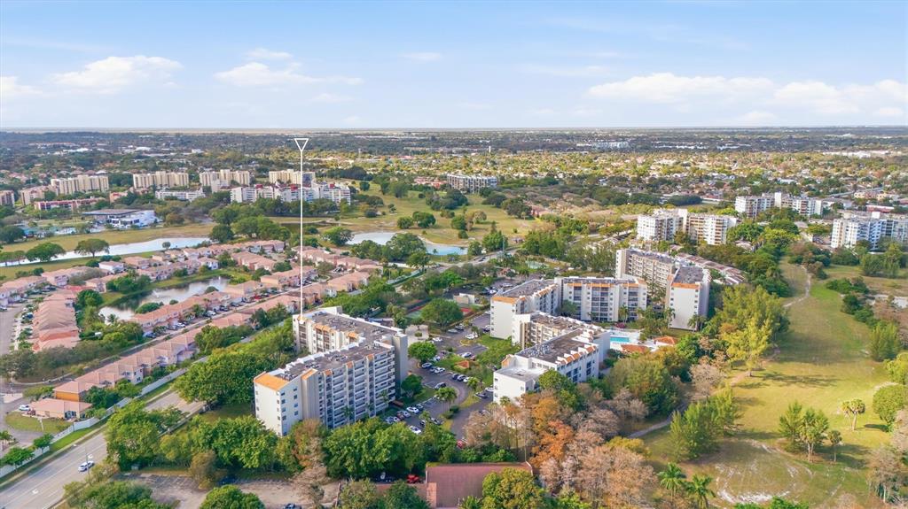 3910 Inverrary Boulevard, Unit 708B Lauderhill, FL 33319 - Photo 43 of 58 an aerial view of residential building with city view