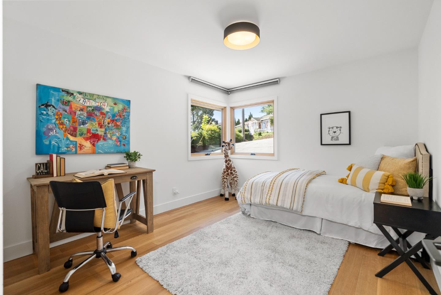 2201 Pullman Avenue Belmont, CA 94002 - Photo 13 of 48 a bedroom with furniture and a window