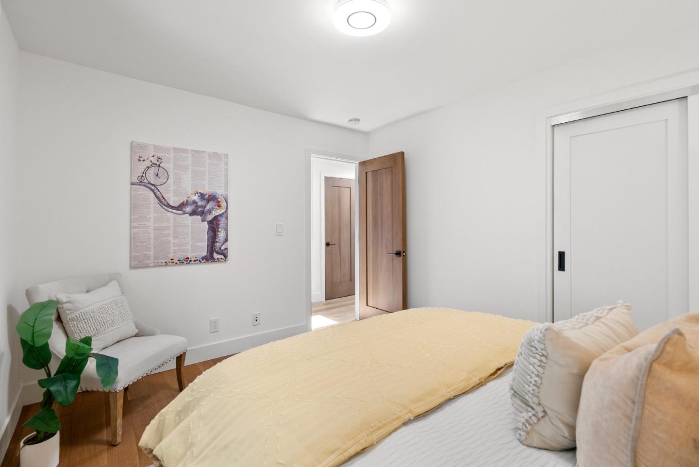 2201 Pullman Avenue Belmont, CA 94002 - Photo 16 of 48 a bedroom with a bed and a couch