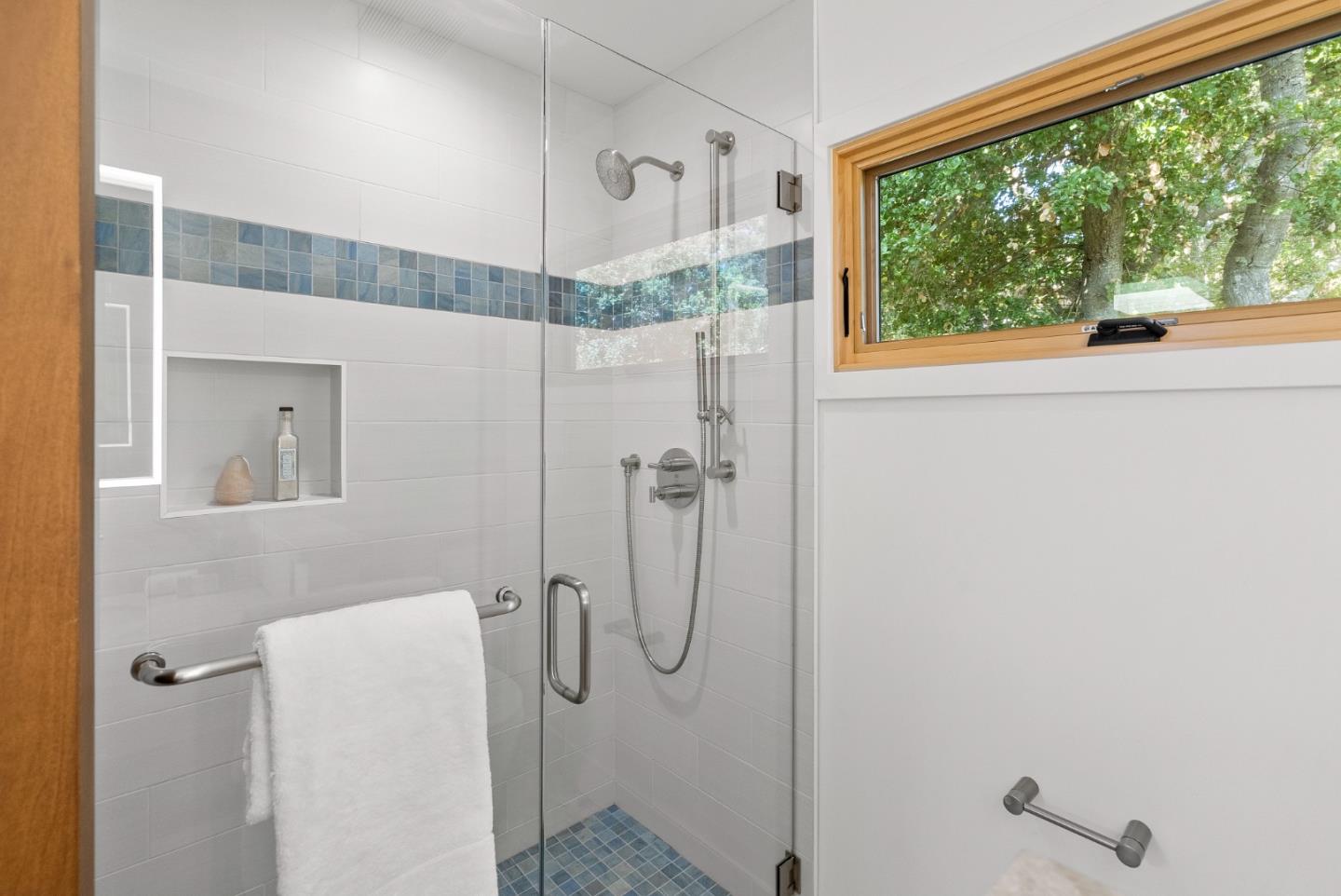 2201 Pullman Avenue Belmont, CA 94002 - Photo 18 of 48 a bathroom with a glass shower door