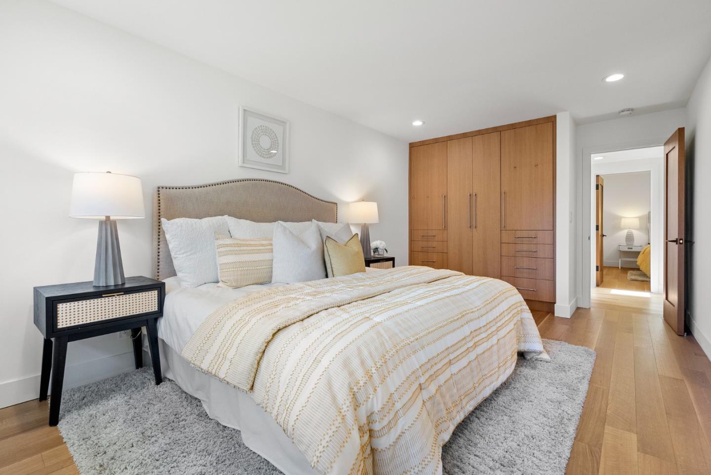 2201 Pullman Avenue Belmont, CA 94002 - Photo 20 of 48 a bedroom with a bed and a lamp