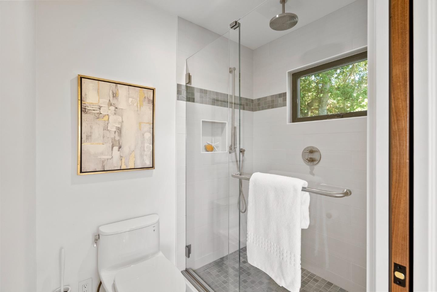 2201 Pullman Avenue Belmont, CA 94002 - Photo 23 of 48 a bathroom with a shower and a toilet
