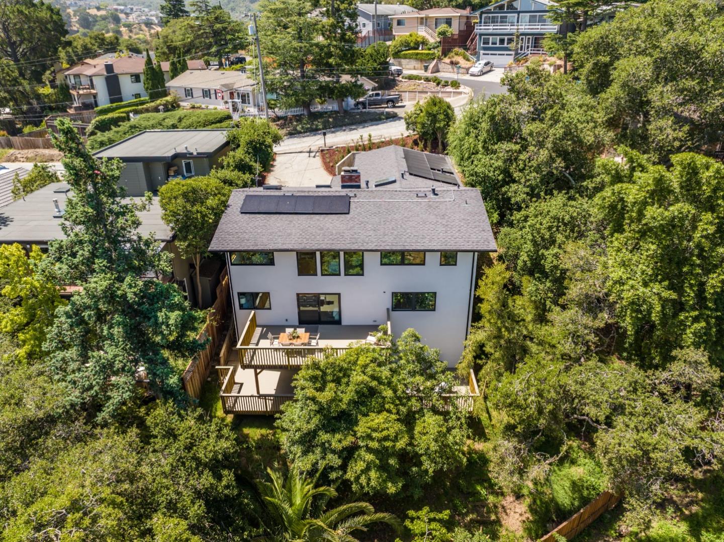 2201 Pullman Avenue Belmont, CA 94002 - Photo 44 of 48 an aerial view of a house with yard swimming pool and lake view