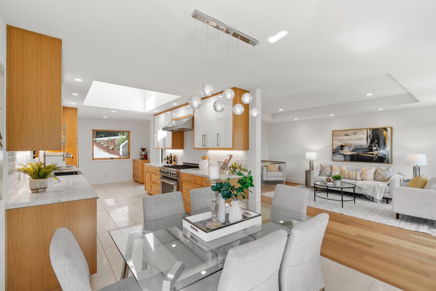 2201 Pullman Avenue Belmont, CA 94002 - Photo 6 of 48 a living room with furniture kitchen view and a wooden floor