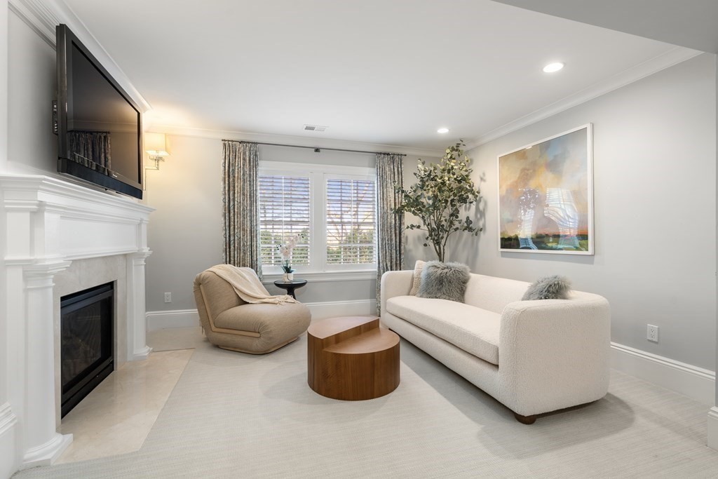 39 Temple Road Wellesley, MA 02482 - Photo 12 of 35 a living room with furniture fireplace and flat screen tv