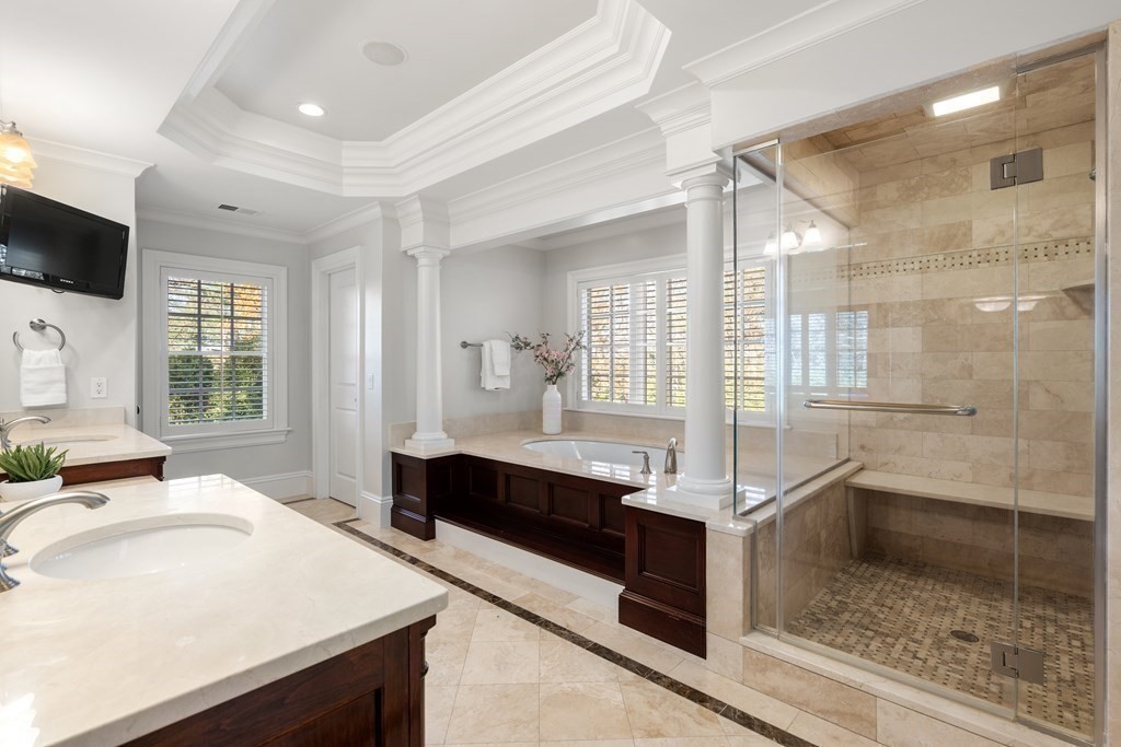 39 Temple Road Wellesley, MA 02482 - Photo 14 of 35 a large bathroom with a large tub and sink