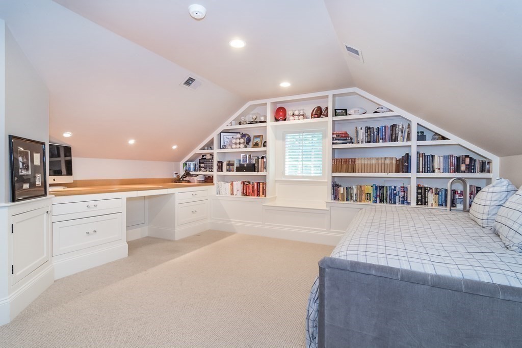39 Temple Road Wellesley, MA 02482 - Photo 19 of 35 a room with cabinets and book shelf
