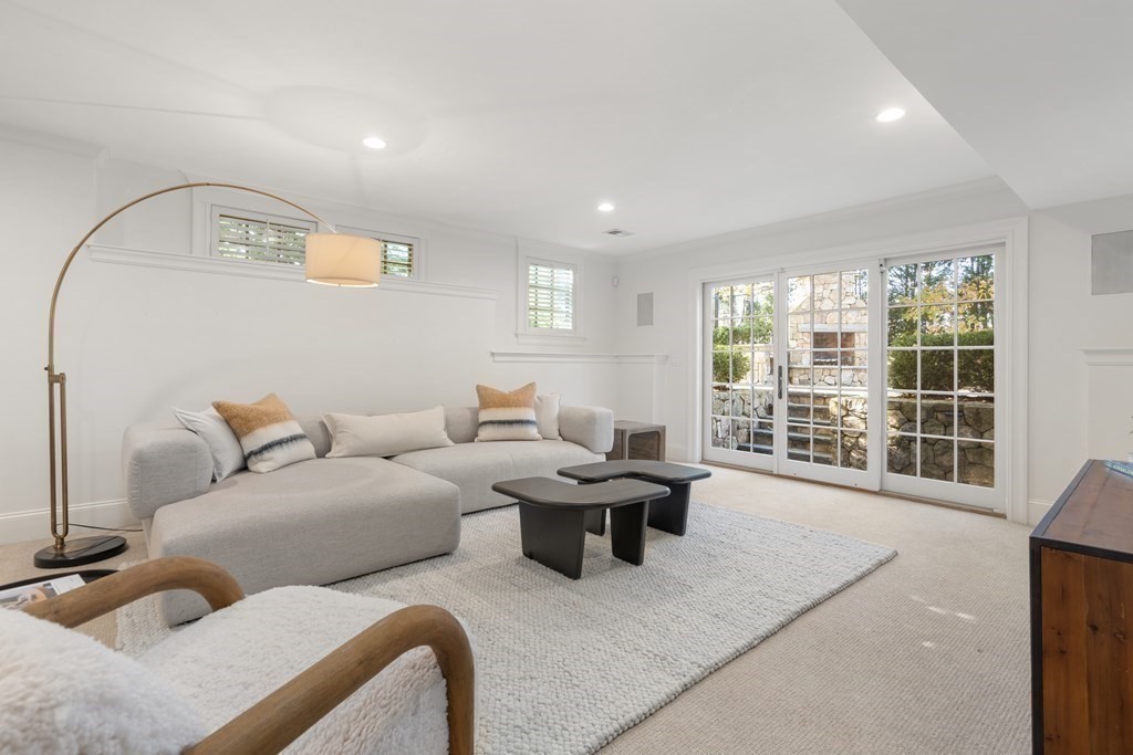 39 Temple Road Wellesley, MA 02482 - Photo 20 of 35 a living room with furniture and a large window