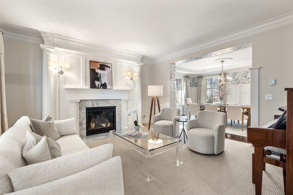 39 Temple Road Wellesley, MA 02482 - Photo 2 of 35 a living room with furniture and a fireplace