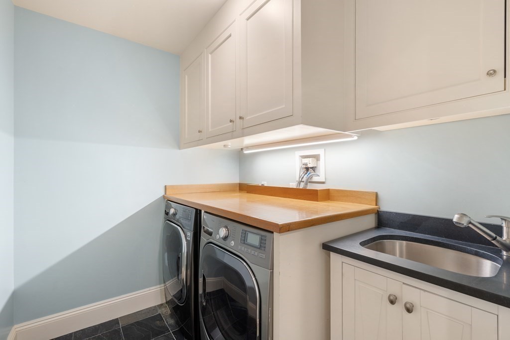 39 Temple Road Wellesley, MA 02482 - Photo 25 of 35 a utility room with sink dryer and washer