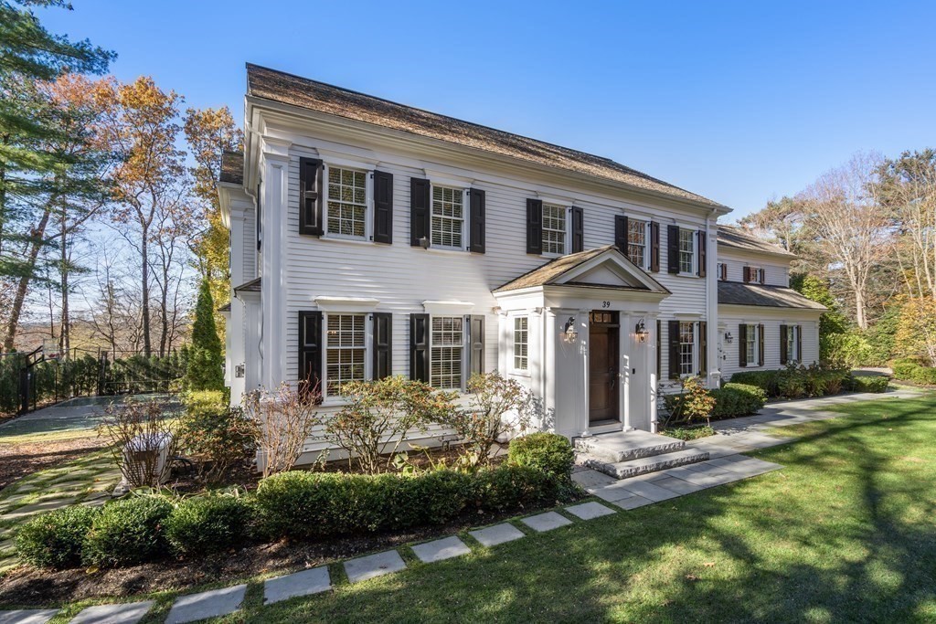 39 Temple Road Wellesley, MA 02482 - Photo 34 of 35 a front view of a house with a yard
