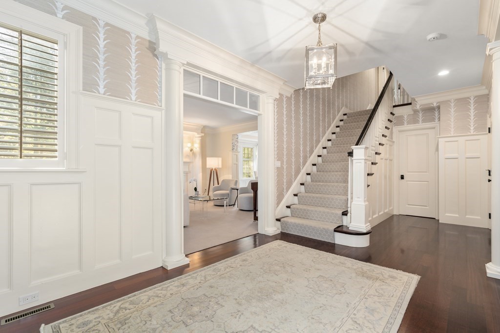 39 Temple Road Wellesley, MA 02482 - Photo 10 of 35 a view of entryway and hall with wooden floor