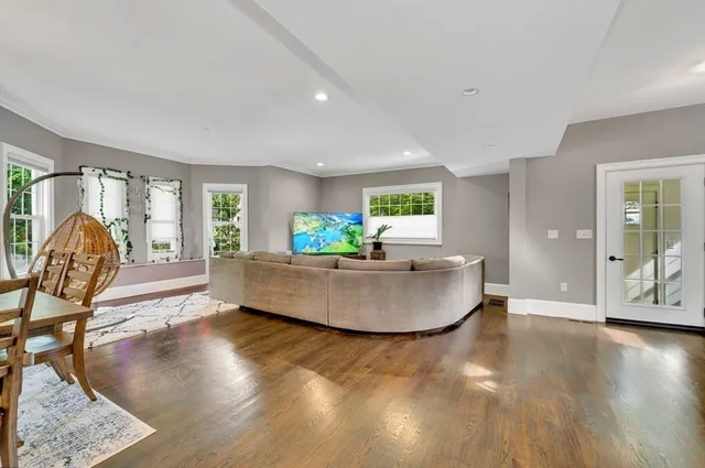 a living room with furniture and a table