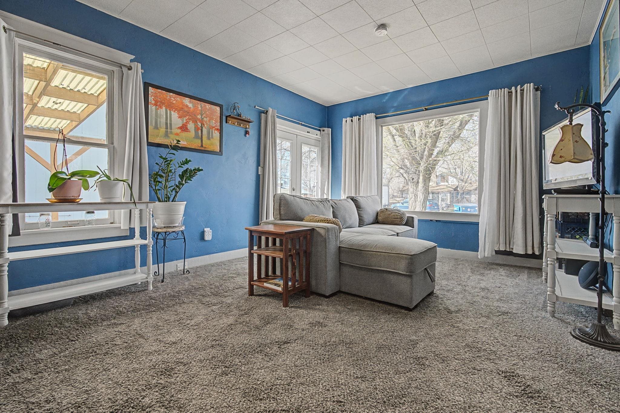 216 4th Street Clifton, CO 81520 - Photo 4 of 17 a living room with furniture and a flat screen tv