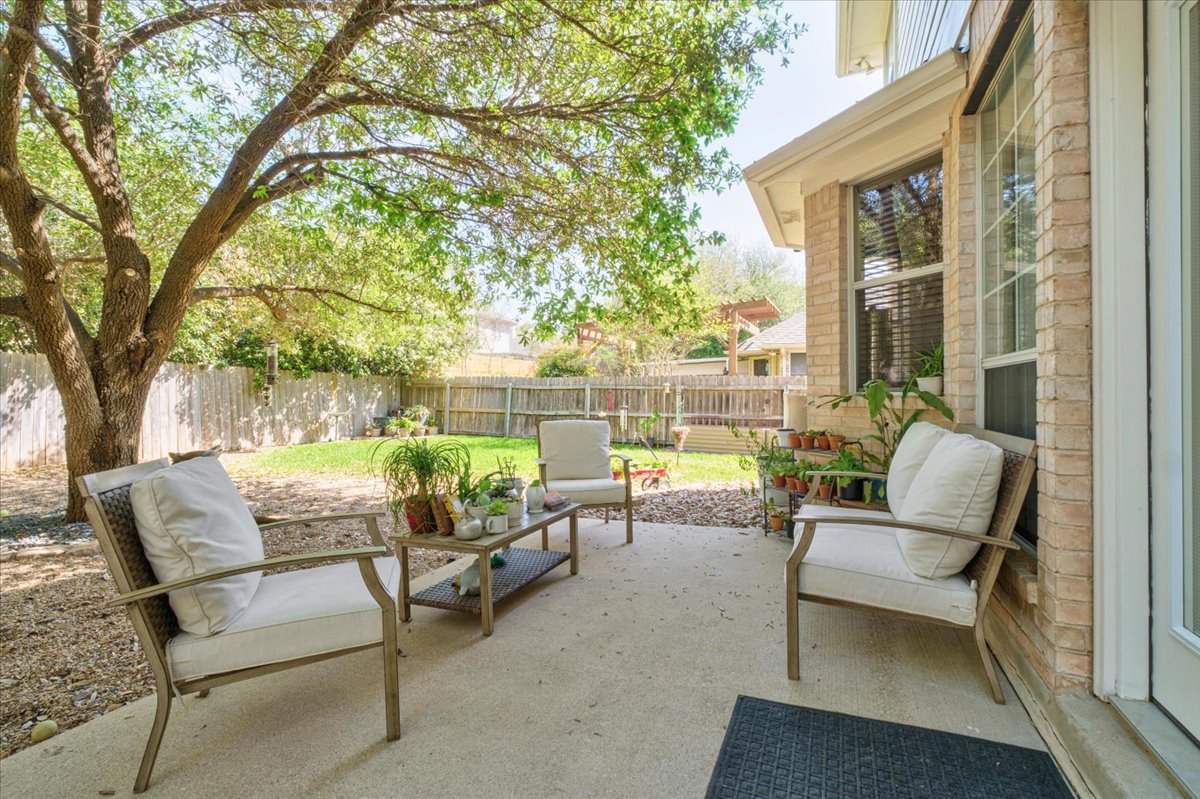 455 Logan Road Georgetown, TX 78628 - Photo 32 of 35 a building outdoor space with patio furniture
