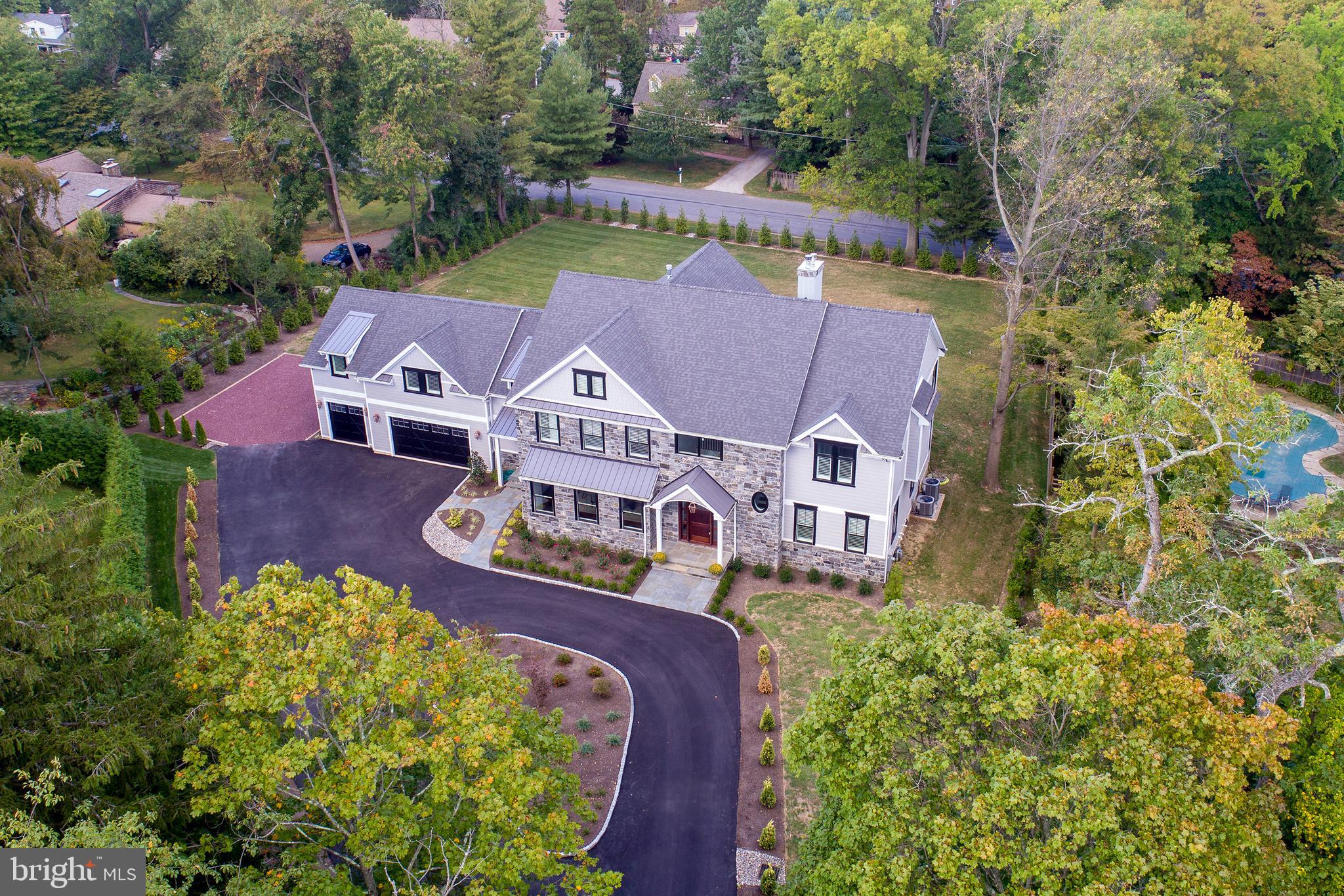 an aerial view of a house with garden space sitting space