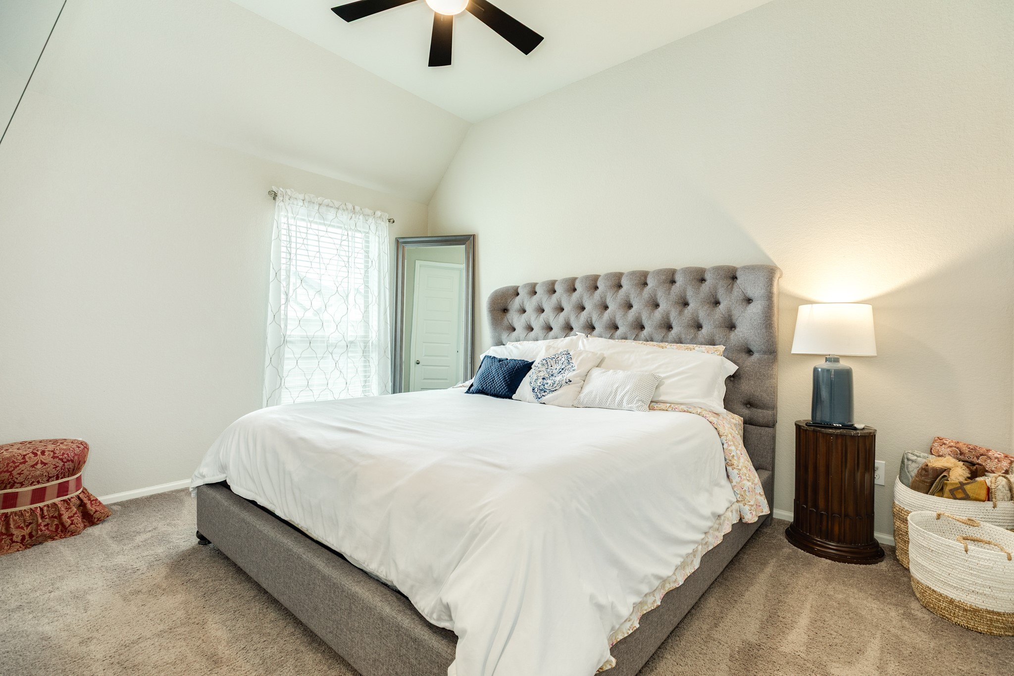 5138 Walnut Grv Lane Manvel, TX 77578 - Photo 27 of 43 a bedroom with a bed and a chandelier