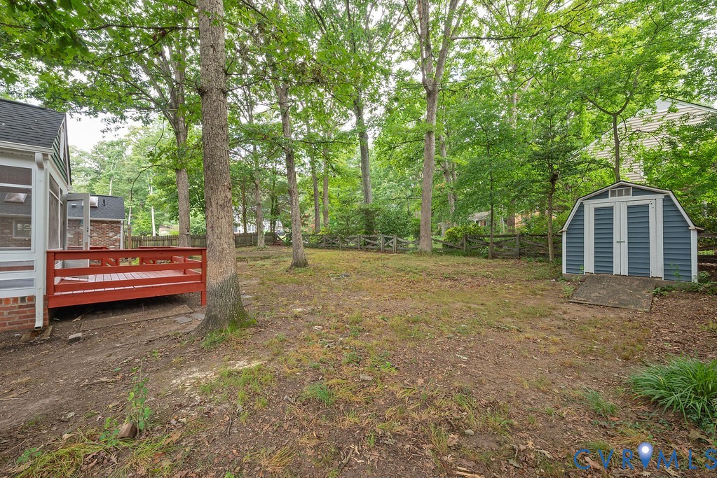 11840 Winfore Drive Midlothian, VA 23113 - Photo 39 of 40 Expansive backyard featuring mature trees, a red w