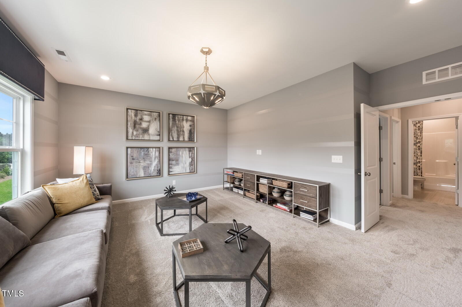 35 Stoddard Lane Garner, NC 27529 - Photo 22 of 38 a view of a livingroom with furniture and window