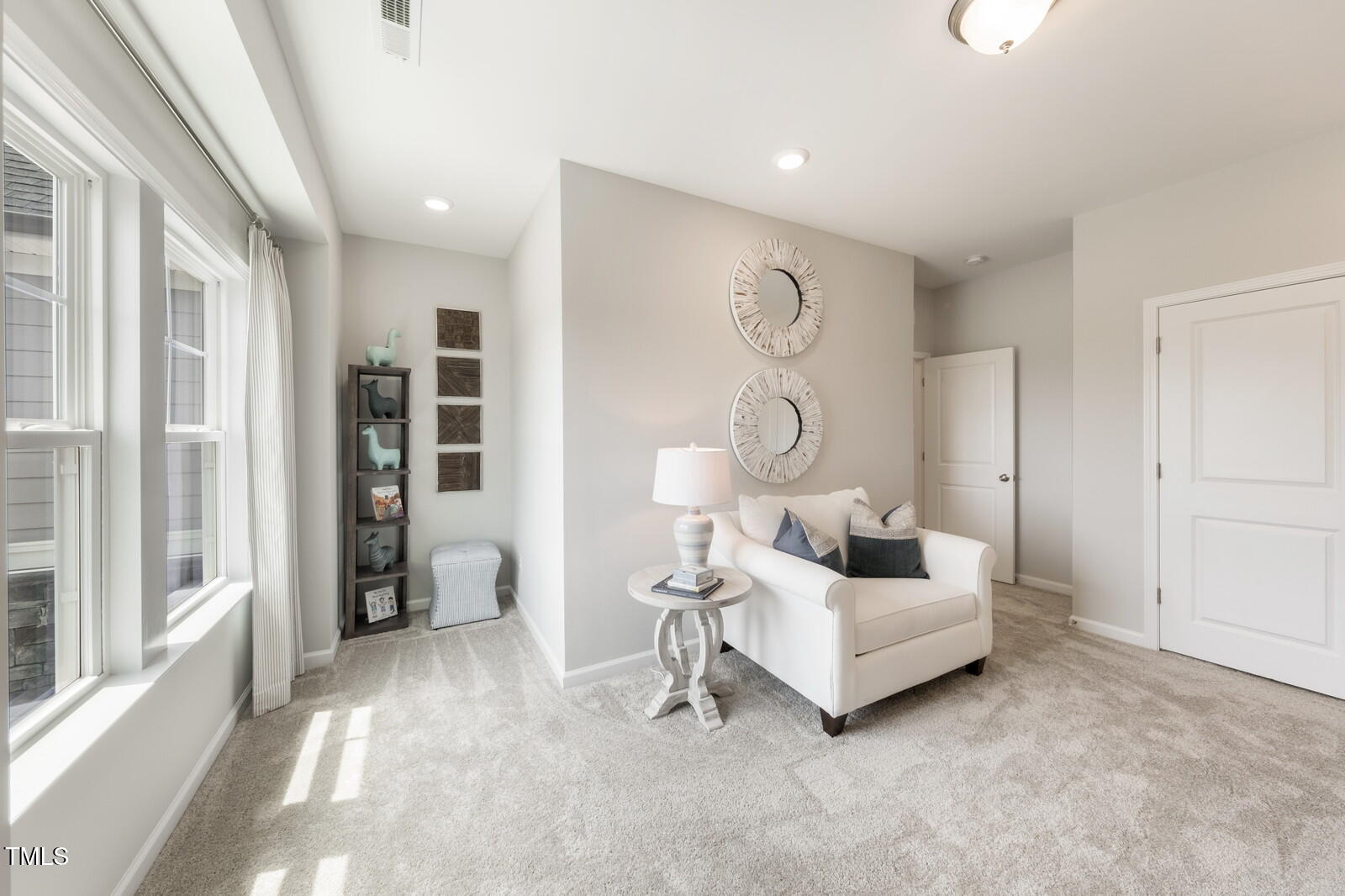 35 Stoddard Lane Garner, NC 27529 - Photo 24 of 38 a living room with furniture and a large window