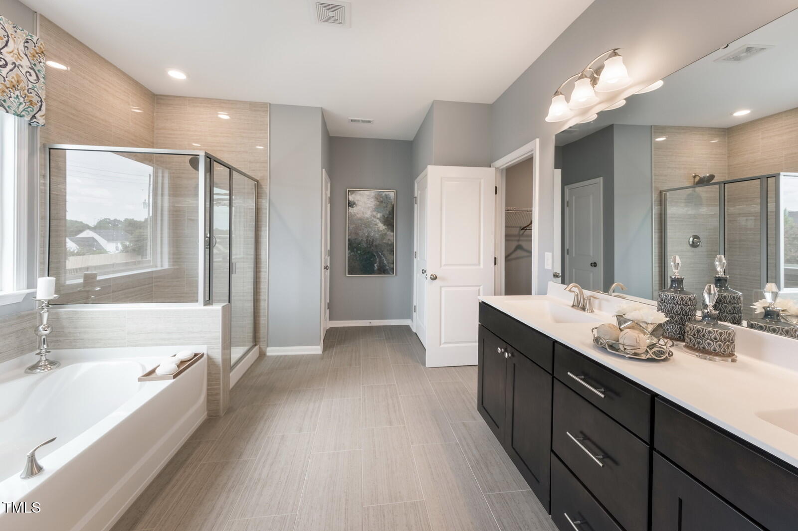 35 Stoddard Lane Garner, NC 27529 - Photo 32 of 38 a spacious bathroom with a large tub shower and sink