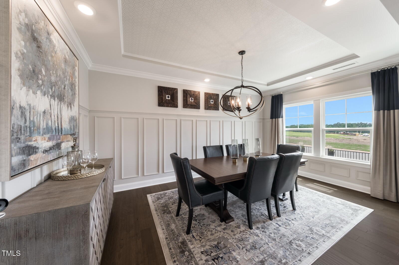 35 Stoddard Lane Garner, NC 27529 - Photo 5 of 38 a view of a dining room with furniture window and wooden floor