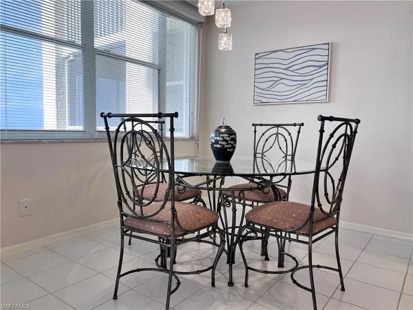 a view of a dining room with furniture