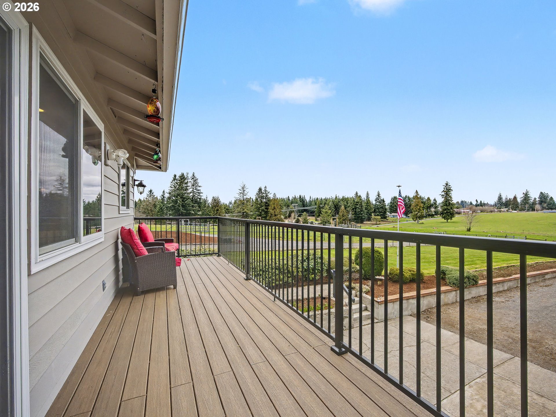 38100 Southeast Trubel Road Sandy, OR 97055 - Photo 14 of 48 a view of roof deck with two chairs and wooden floor