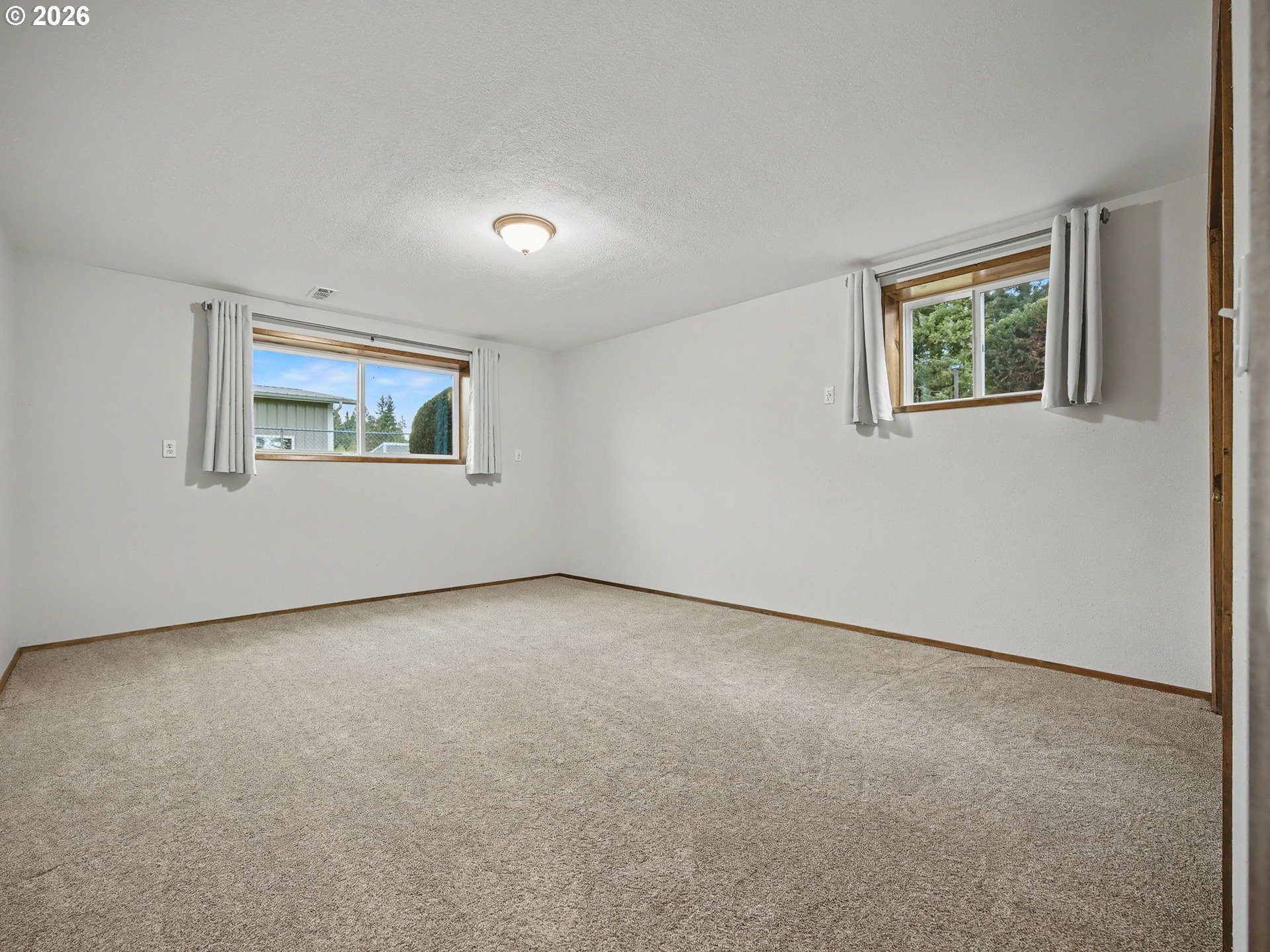38100 Southeast Trubel Road Sandy, OR 97055 - Photo 24 of 48 a view of an empty room with a window