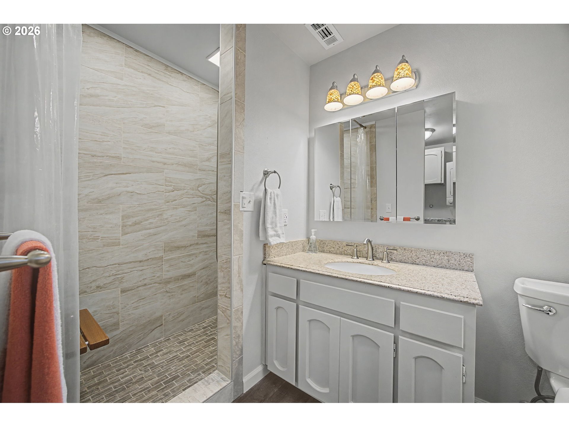 38100 Southeast Trubel Road Sandy, OR 97055 - Photo 25 of 48 a bathroom with a sink a toilet a mirror and shower
