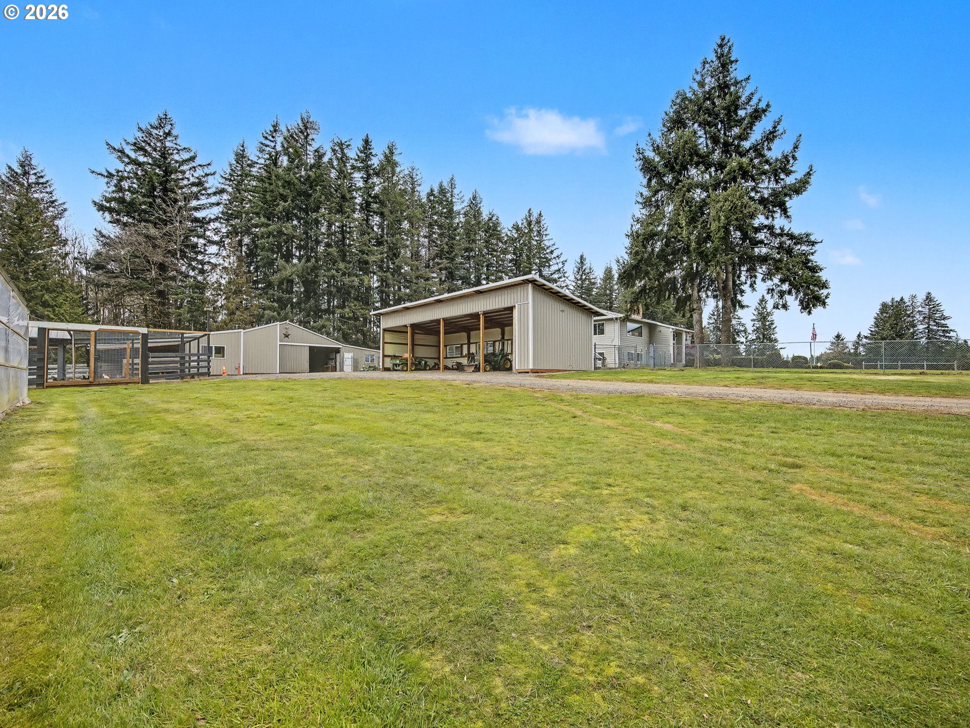 38100 Southeast Trubel Road Sandy, OR 97055 - Photo 39 of 48 a view of house with a big yard and large trees