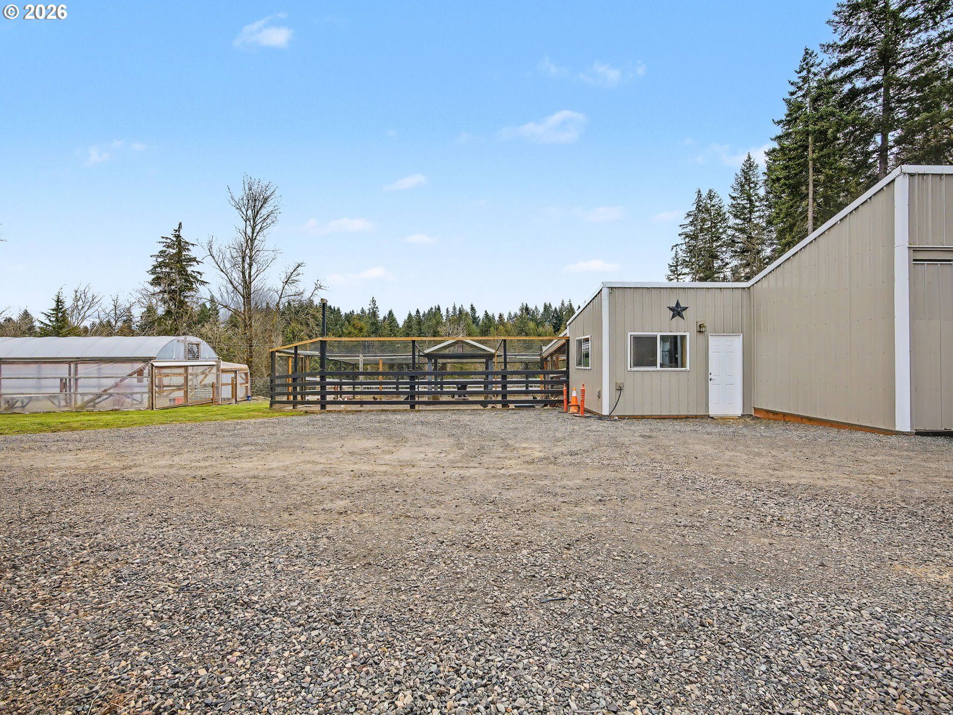 38100 Southeast Trubel Road Sandy, OR 97055 - Photo 40 of 48 a view of a house with backyard and trees